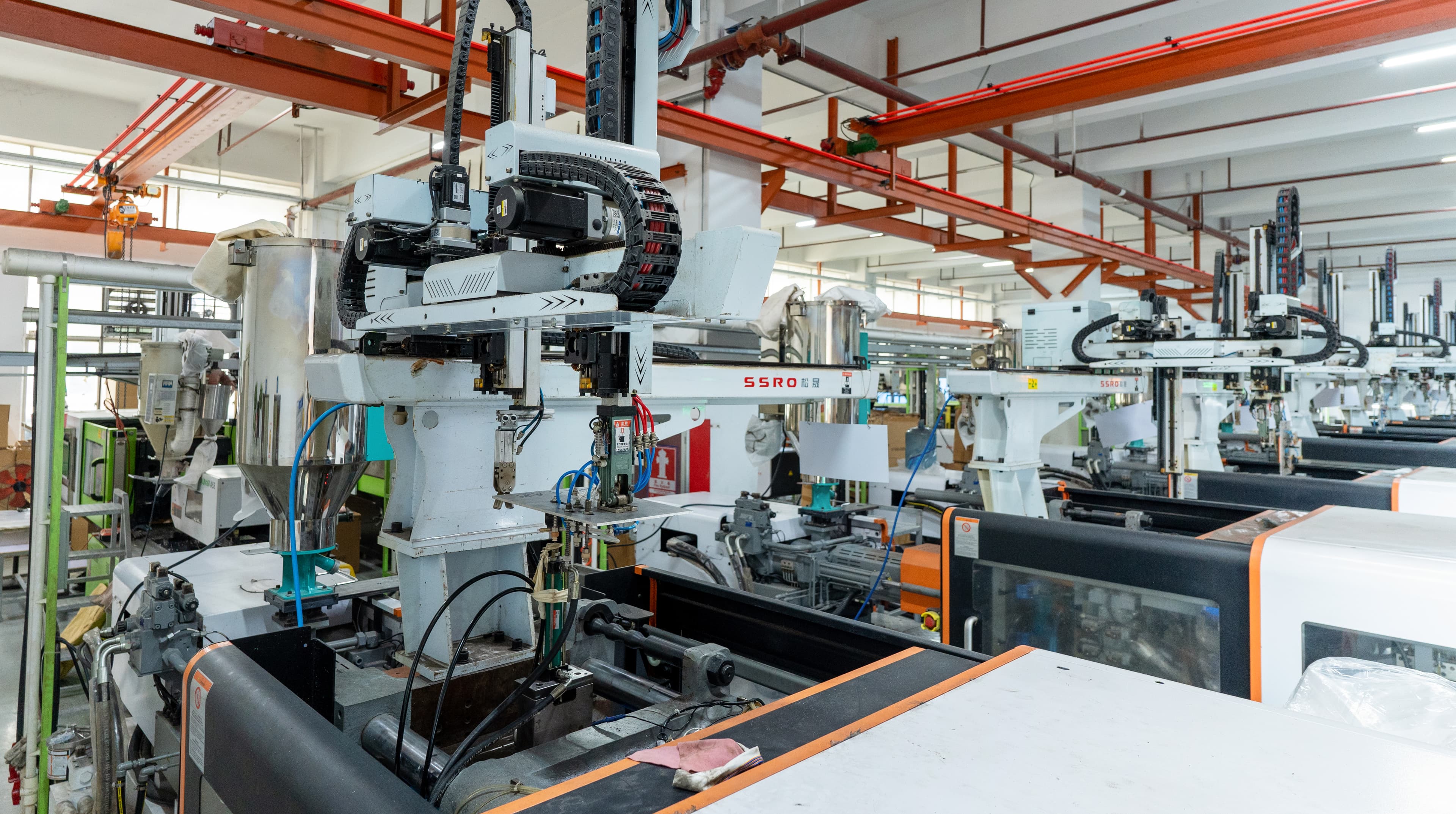 Automated injection-moulding equipment in BaiChang’s production workshop